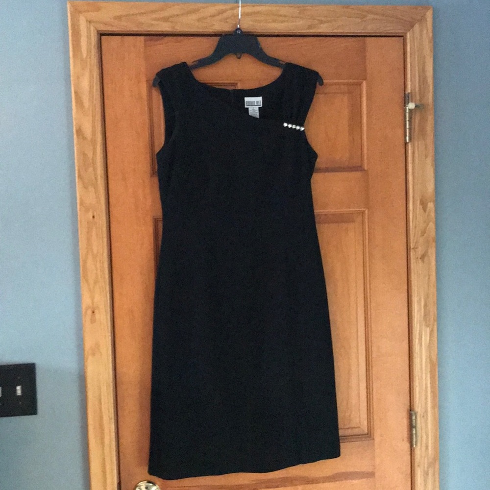 Black Dress. 100% polyester w rhinestone pendant.